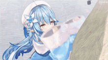 a close up of a blue haired anime girl with a flower on her head .