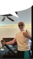 a man wearing sunglasses is giving a thumbs up in a bedroom