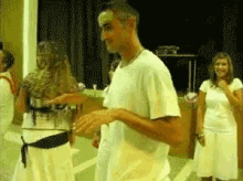 a man wearing a card on his head that says ' i love you '