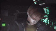 a man in a video game is looking at a screen with the letters ehc on it