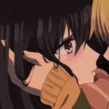 a close up of a person touching a girl 's hair