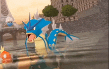a blue and yellow pokemon swimming in the water