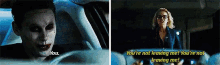 the joker is driving a car and talking to a woman