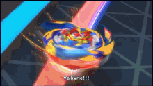 a person is holding a colorful spinning top that says valkyrie !!!