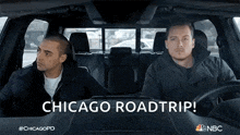 two men are sitting in a car and one of them is saying `` chicago roadtrip ! ''