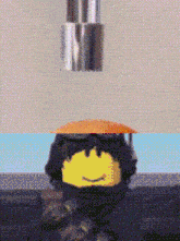 a close up of a lego character with a umbrella on his head