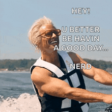a man wearing a life jacket says hey u better be havin a good day