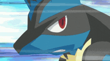a close up of a blue and black cartoon character with red eyes