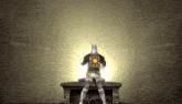 a knight in a knight 's helmet is holding a sword and shield in a dark room .
