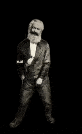a man with a beard is wearing a black jacket