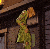a cartoon of a man standing in front of a brick building .