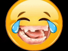 a smiley face with tears coming out of its eyes and a missing tooth