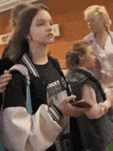 a girl wearing a lucky lucky lucky t-shirt