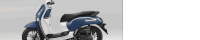 a blue and white scooter is sitting on a white surface