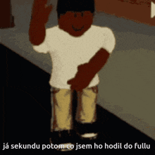 a man in a white shirt and tan pants is walking down a street
