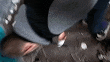 a blurry picture of a person wearing a hat and white socks