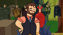 a man with a beard is standing in front of clothes hanging on a line