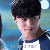 a close up of a man 's face with the words te amo mari written on the bottom