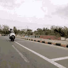 Riding A Motorcycle Faisal Khan GIF - Riding A Motorcycle Faisal Khan Fasbeam GIFs