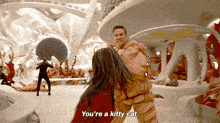 a scene from a movie where a woman says " you 're a kitty cat " to a man