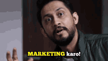 a man with a beard is making a funny face and says marketing karo
