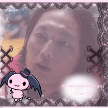 a picture of a man with the words nanniya loves nan-gyu in the corner