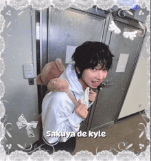 a picture of a person with the name sakuya de kyle on the bottom