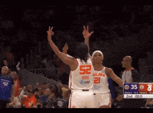 a basketball player with the number 52 on their back