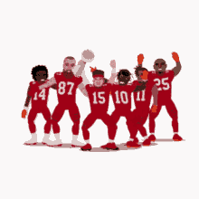 a group of football players wearing red uniforms with the numbers 14 15 10 11 and 25 on them