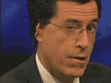 Stephen Colbert Wink GIF - Stephen Colbert Wink Ear Twitch GIFs