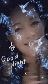 a woman 's face is surrounded by water and the words good night