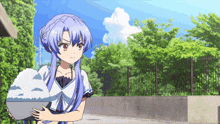 a girl with blue hair holds a bowl of snow