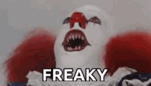 a close up of a clown with a red nose and the word freaky written next to it .