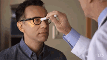 Eye Exam With Optometrist GIF - Eye Exam Physical Doctor GIFs