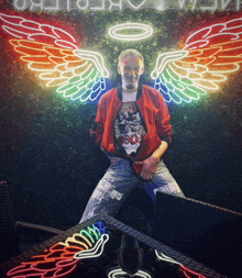 a man in a red jacket stands in front of a neon sign with wings and an angel halo