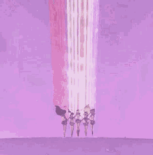 a group of girls standing next to each other in front of a purple background with a rainbow coming out of it .