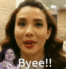 a close up of a woman 's face with the words byee on it