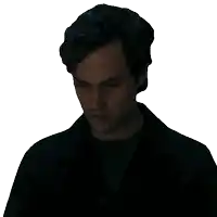 a close up of a man 's face with a serious look on his face