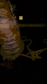 a painting of a snake with the letter t in the lower right corner