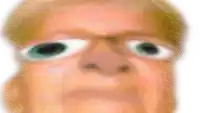 a close up of a man 's face with a very large eye
