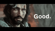 a man with a beard has blood on his face and the word good is above him