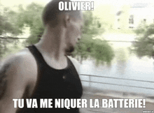 a man in a black tank top says olivier