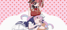 two anime girls are laying on a bed with hearts on the background