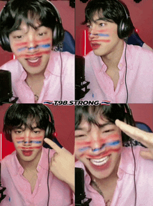 a man wearing headphones and a pink shirt has red white and blue painted on his face ..