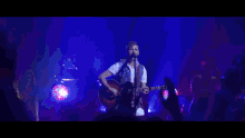 a blurry picture of a person dancing in a dark room