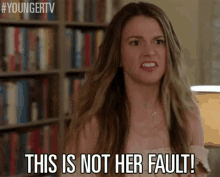 Defensive GIF - Sutton Foster This Is Not Her Fault Not Her Fault GIFs