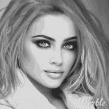 a woman 's face is shown in a black and white photo with the word werble on the bottom right