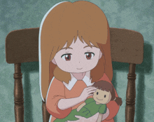 a cartoon girl is holding a doll in her arms