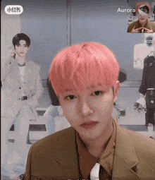 a man with pink hair has aurora written on the bottom right