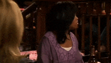 two women are talking to each other and one of them is saying `` i don 't like this anymore than you do ''